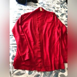 Bright red ladies knit sweater. No button cardigan